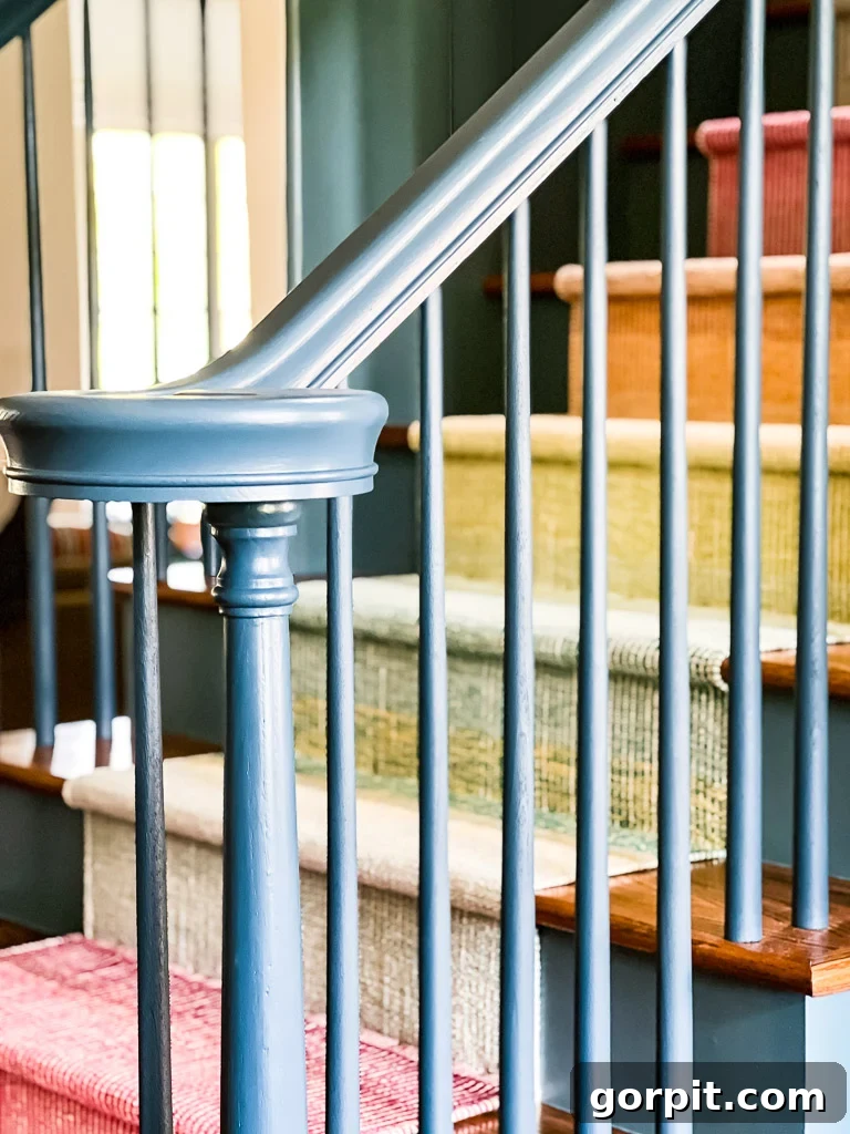 Another before-and-after comparison of the staircase, highlighting the new balusters