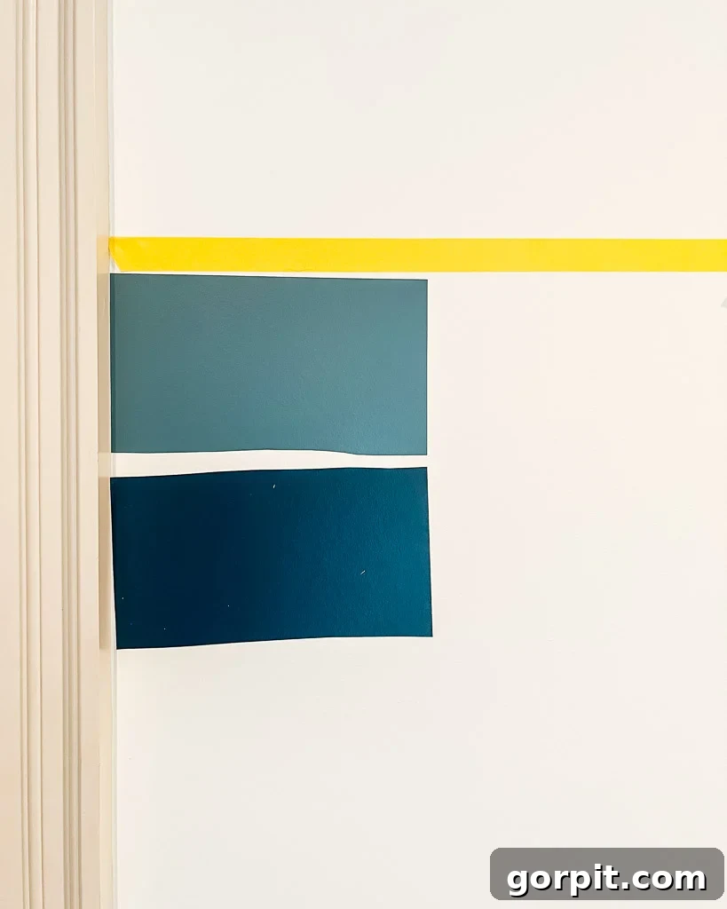 Samplize peel and stick paint samples arranged on a white wall, demonstrating how to test multiple colors.