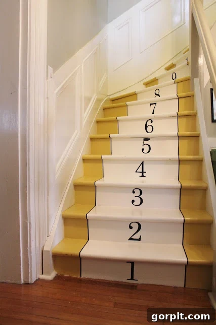 Merdivenlerinizi Şıklaştırın: İlham Veren Koşucu Halı Fikirleri 6 A painted yellow staircase with numbers counting upward is one of many stair runner ideas you can use to update your home.