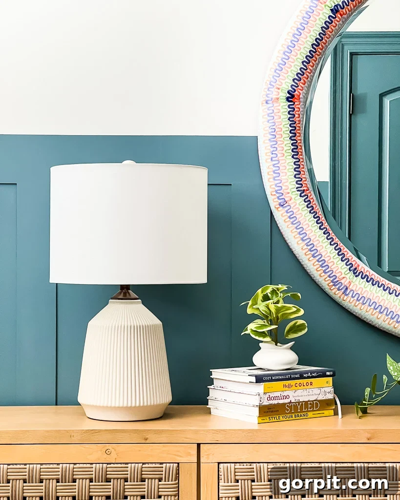 Effortless Board and Batten Accent Wall Transformation 5 close up of board and batten, mirror, and lamp