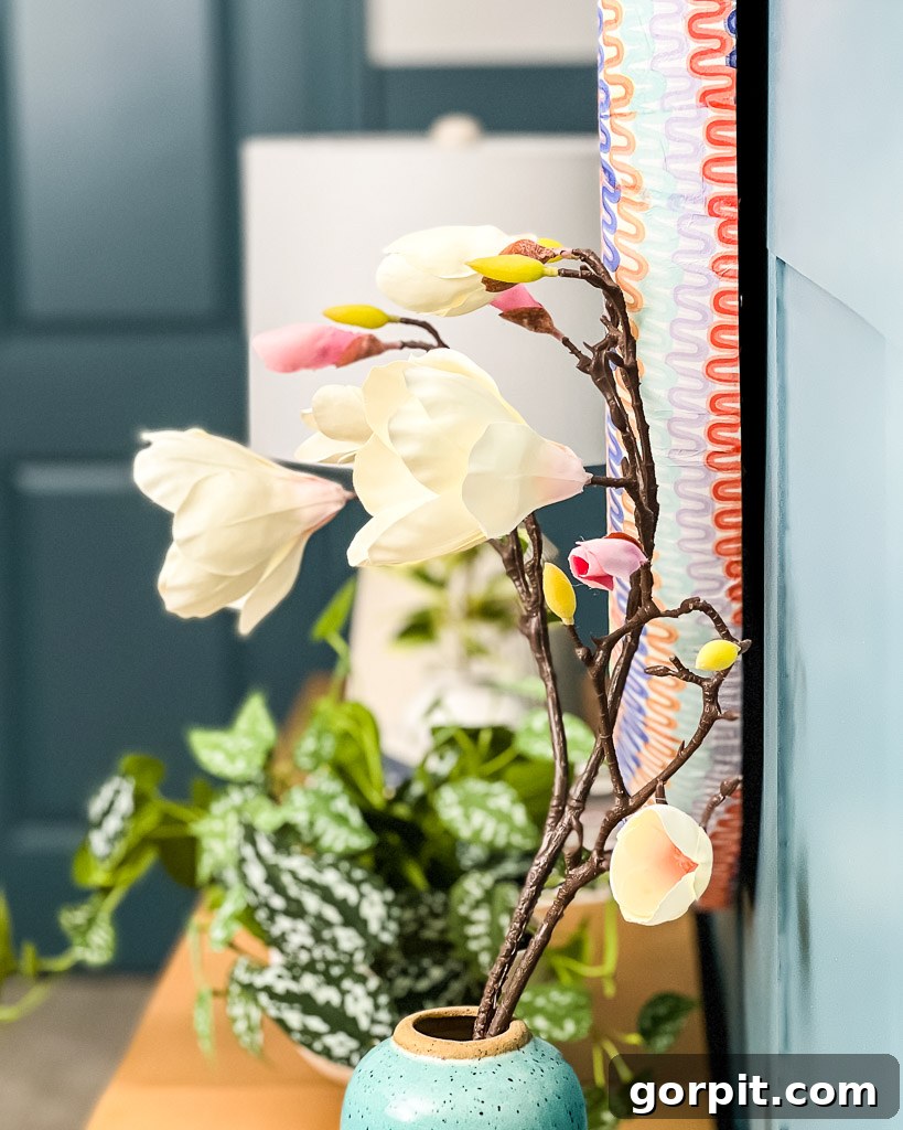 Effortless Board and Batten Accent Wall Transformation 8 board and batten with napkin mirror and flower stem