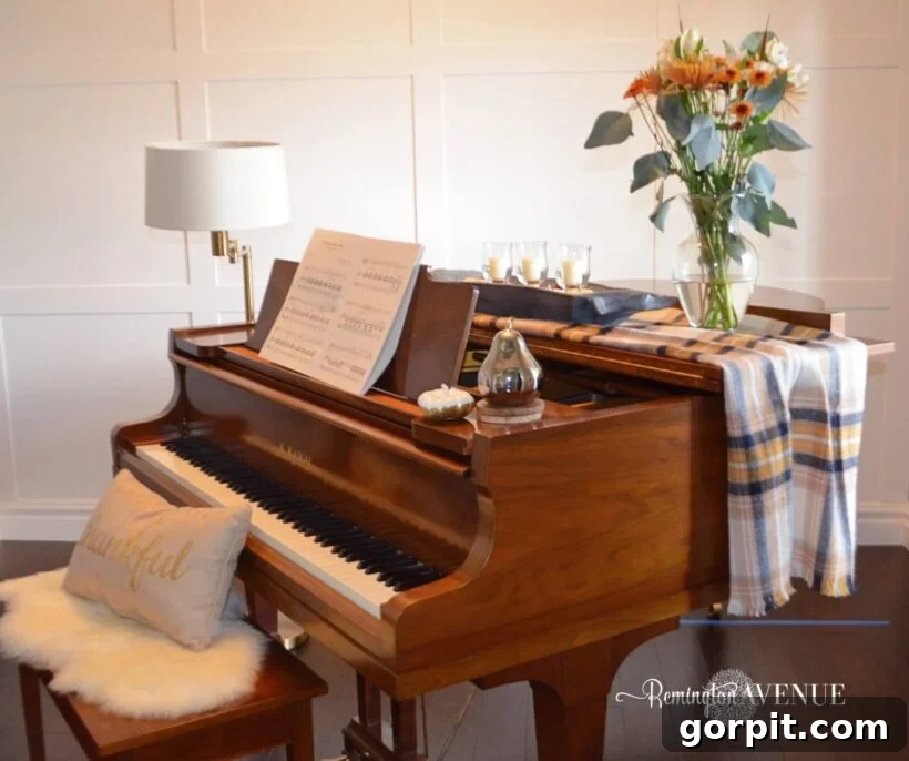 Transform Your Walls with DIY Board and Batten 25 A magnificent oak grand piano is elegantly positioned in front of a pristine white board and batten grid wall, creating a sophisticated and timeless musical space.
