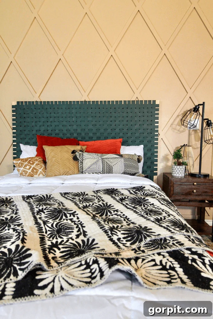 Transform Your Walls with DIY Board and Batten 9 A vibrant butterscotch wall comes alive with a striking diamond board and batten pattern, serving as a dynamic backdrop for a plush green headboard and an array of funky, multicolored pillows, creating an energetic and playful bedroom aesthetic.