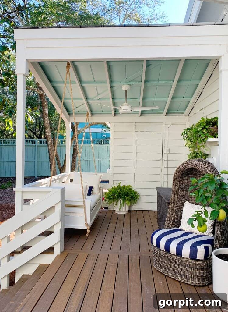 Porch Perfection: Designer Decor and Styling Tips 11 DIY hanging daybed on back porch