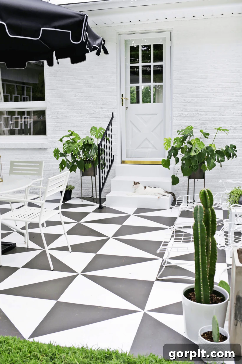 Porch Perfection: Designer Decor and Styling Tips 13 painted concrete patio to look like black and white tile