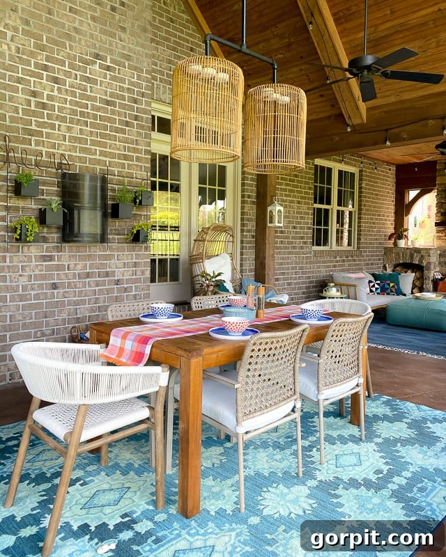Porch Perfection: Designer Decor and Styling Tips 7 coordinating blue rugs in large outdoor space