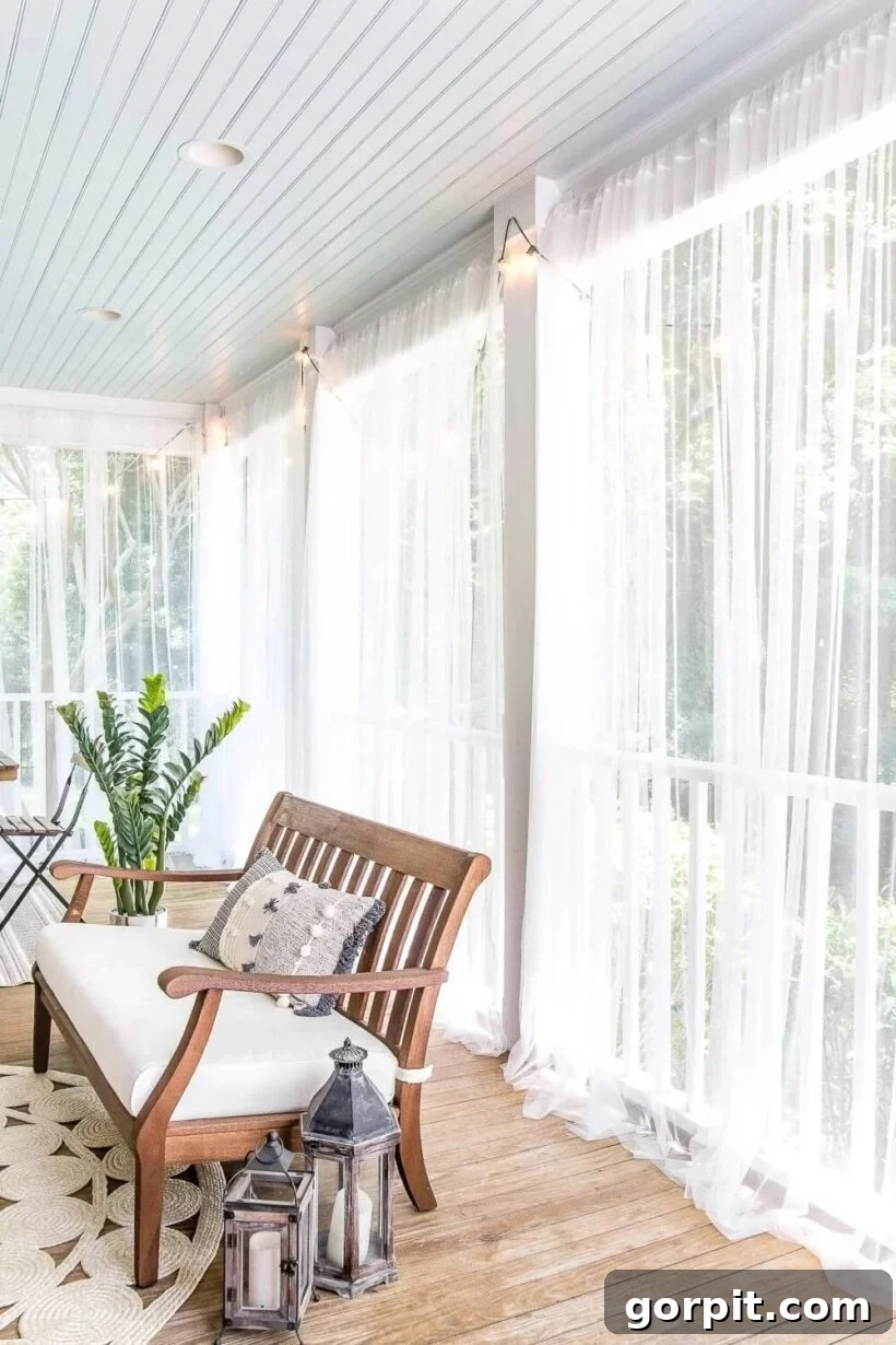 Porch Perfection: Designer Decor and Styling Tips 8 porch with sheer privacy curtains