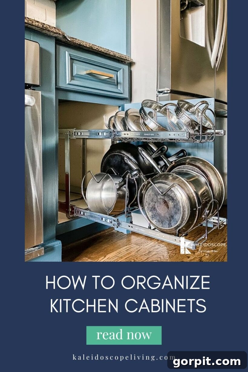 A graphic with a picture of a pull-out drawer with a pan and pot holder is framed by blue borders and the bottom says, "How to Organize Kitchen Cabinets Read Now KaleidoscopeLiving.com."