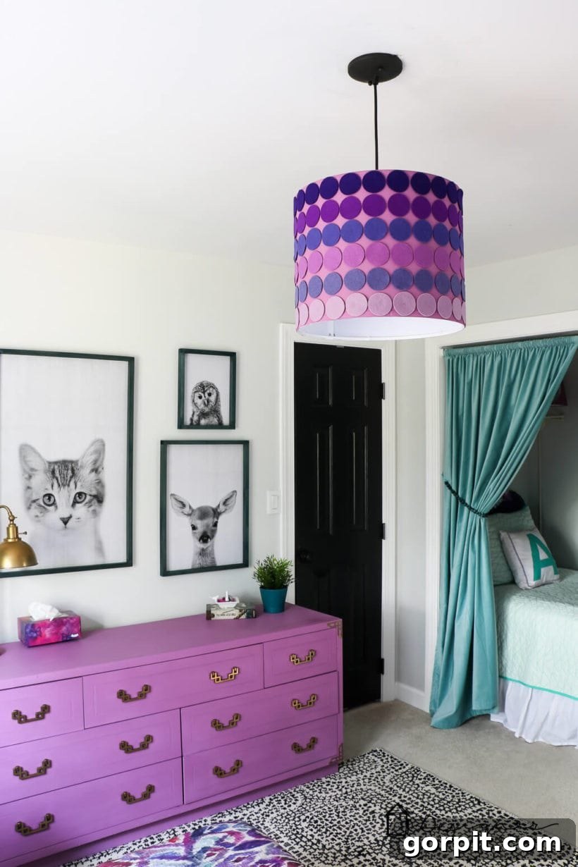 DIY ombre lampshade decorated with felt circles cut by a Cricut Maker, showcasing intricate crafting.