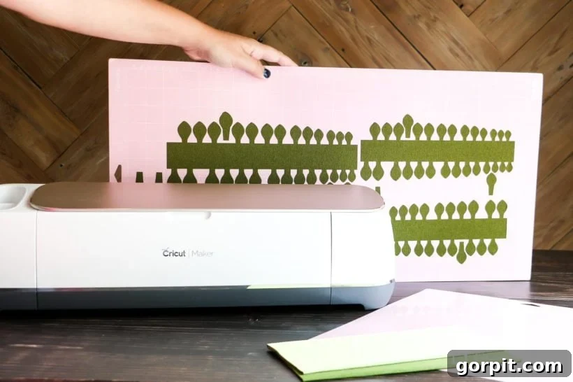 Delicately cut crepe paper pieces for crafting, precisely cut by a Cricut Maker.