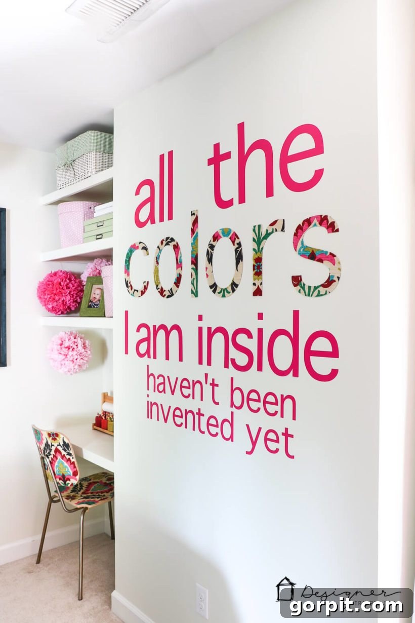 Decorative chipboard letters spelling 'colors' covered in fabric, cut using a Cricut Explore Air 2.