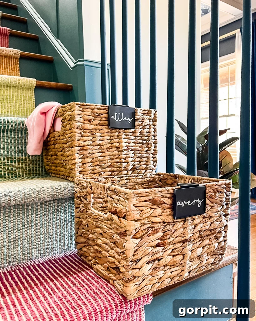 Cricut Label Mastery: My Two Essential Methods 10 Name labels created with Cricut Joy for water hyacinth baskets, clipped onto the baskets for an organized stairwell.