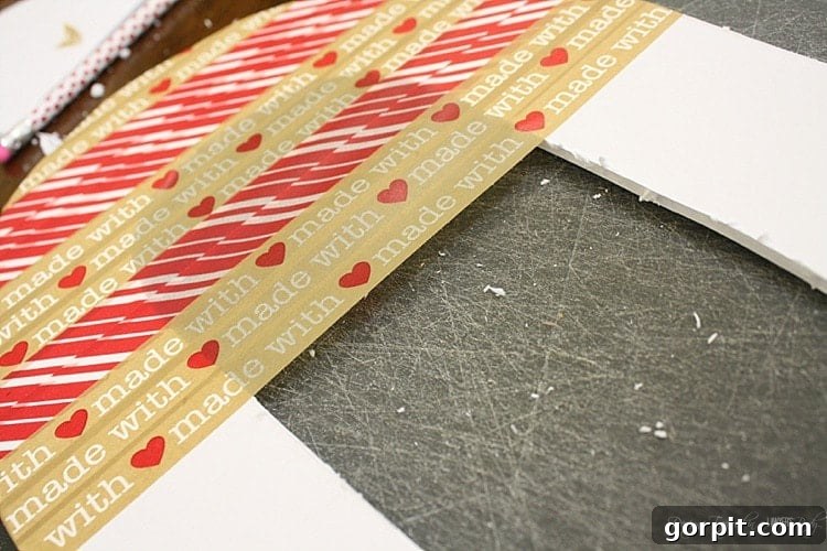 The 'O' shape with its edges neatly covered in washi tape, demonstrating how to achieve a smooth and finished look for your DIY wreath base.