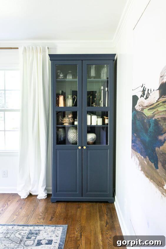 navy IKEA cabinet in dining room