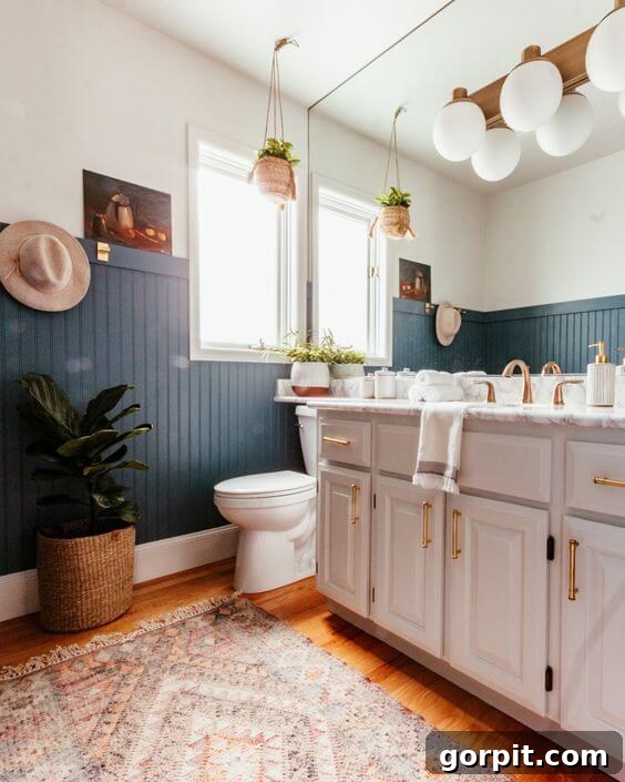 blue green wainscoting in bathroom
