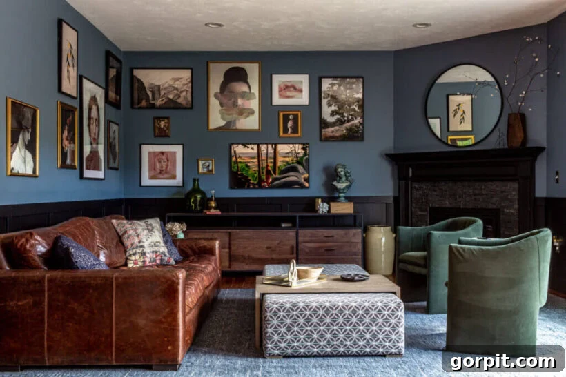 moody blue gray painted walls with gallery art
