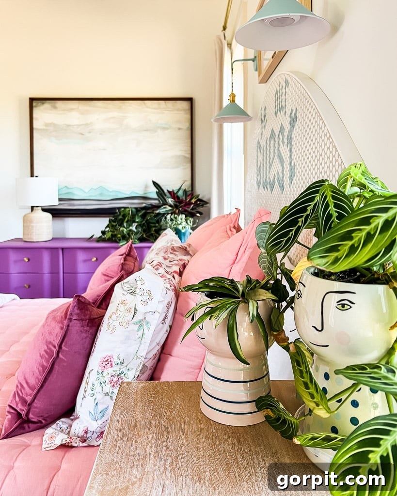A bright guest room reveal, showcasing a harmonious blend of eclectic decor and an abundance of lush green plants, creating a refreshing atmosphere.