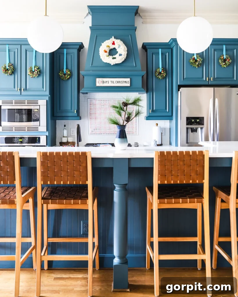 Christmas Kitchen with Mini Wreaths on Cabinets