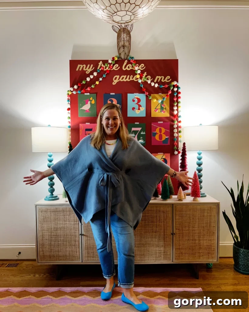 Large DIY Christmas art featuring the 12 Days of Christmas prints, accompanied by Tasha Agruso of Kaleidoscope Living, showcasing a personalized holiday decor statement.