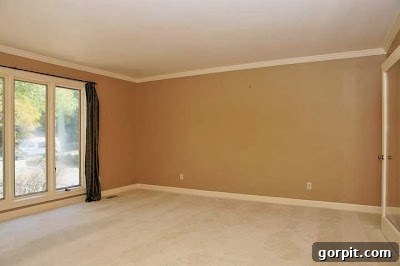 Before Playroom Makeover - Drab Walls and Carpet