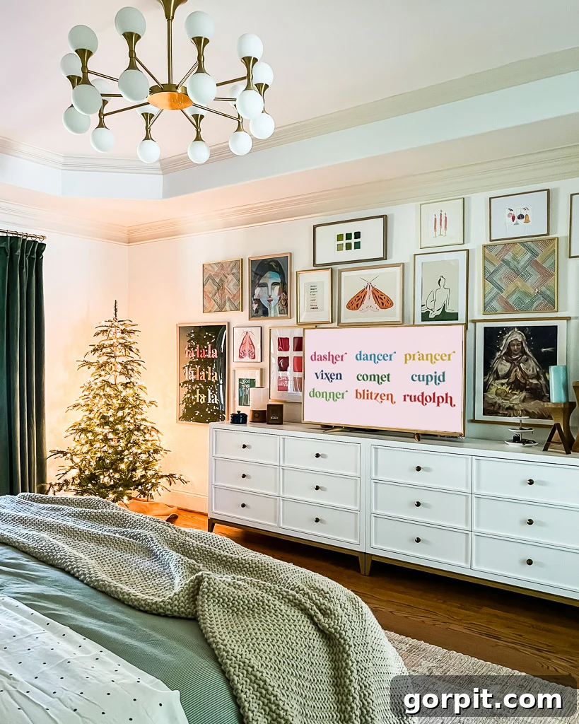 Bringing Christmas Magic to Your Bedroom 6 A bedroom gallery wall featuring a mix of holiday art prints, including a Fa La La print and watercolor illustrations, adding festive cheer.