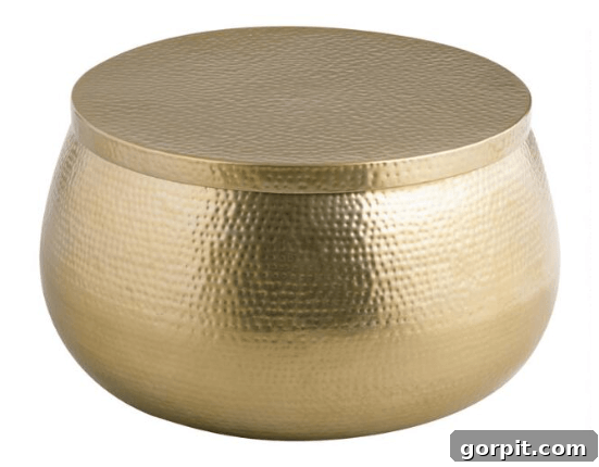 Statement Coffee Table Designs 6 World Market Cala hammered gold storage coffee table, round and versatile