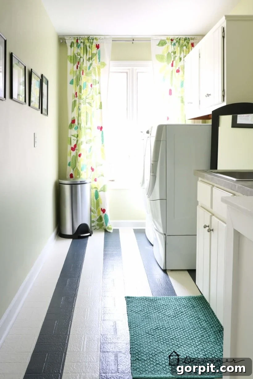 Stunning DIY painted vinyl floors in a freshly renovated laundry room.