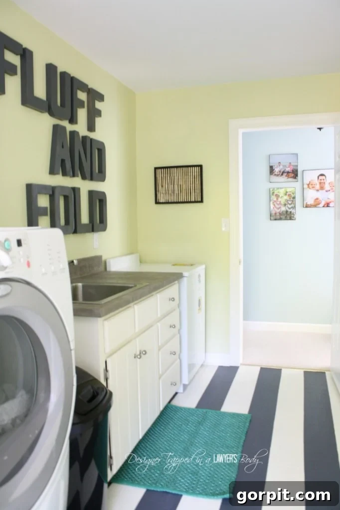Close-up of the stylish DIY concrete countertop in the laundry room.