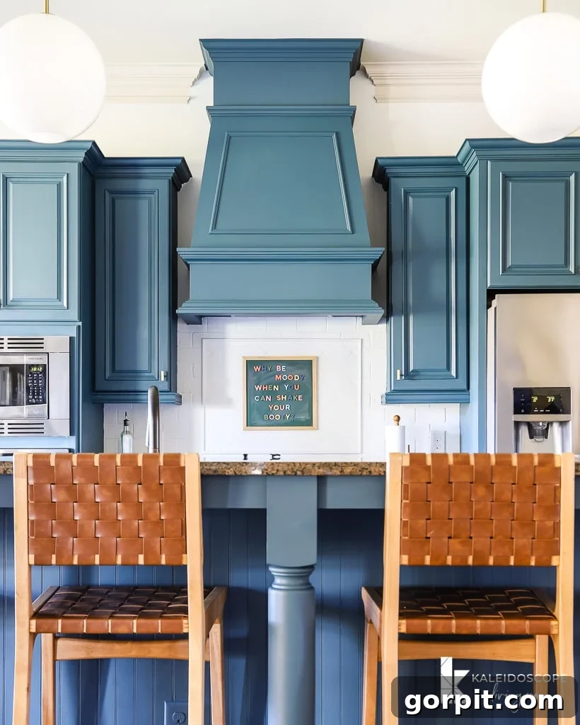 Our kitchen cabinets beautifully transformed with Fusion Mineral Paint, demonstrating its lasting finish and durability in a real home setting.