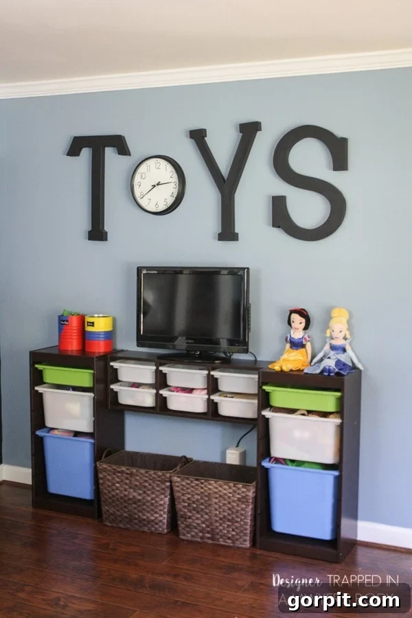 Black papier-mâché letters spelling 