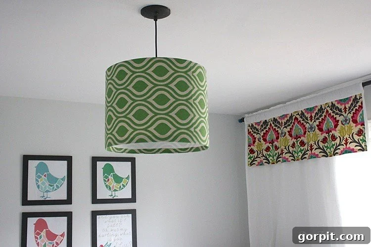 Craft Your Own Pendant Light 16 Elegant view of the DIY pendant light from below, highlighting the twin light-socket adapter and bulbs.