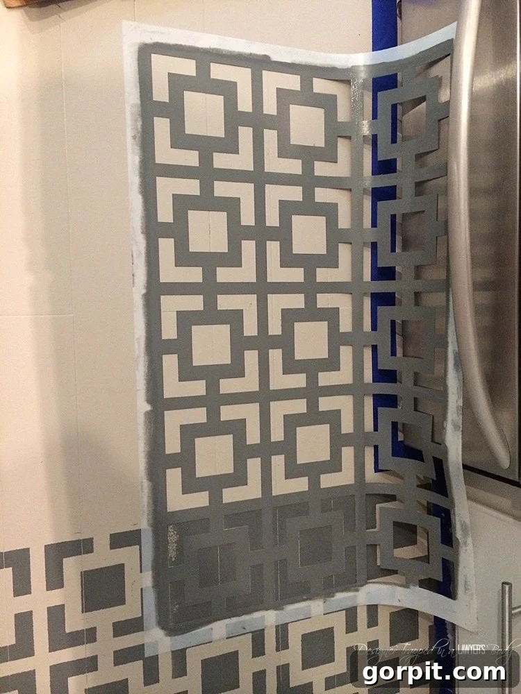 AMAZING! Do you have badly damaged wood floors that you can afford to refinish? This is a great option! Love the look of these stenciled floors! Check out the full tutorial by Designer Trapped in a Lawyer's Body.