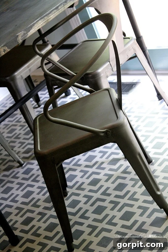 AMAZING! Do you have badly damaged wood floors that you can afford to refinish? This is a great option! Love the look of these stenciled floors! Check out the full tutorial by Designer Trapped in a Lawyer's Body.