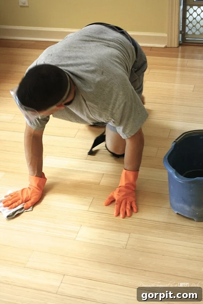AMAZING! Do you have badly damaged wood floors that you can afford to refinish? Check out this DIY stenciled floor tutorial. It's amazing how paint can transform a floor! By Designer Trapped in a Lawyer's Body. 