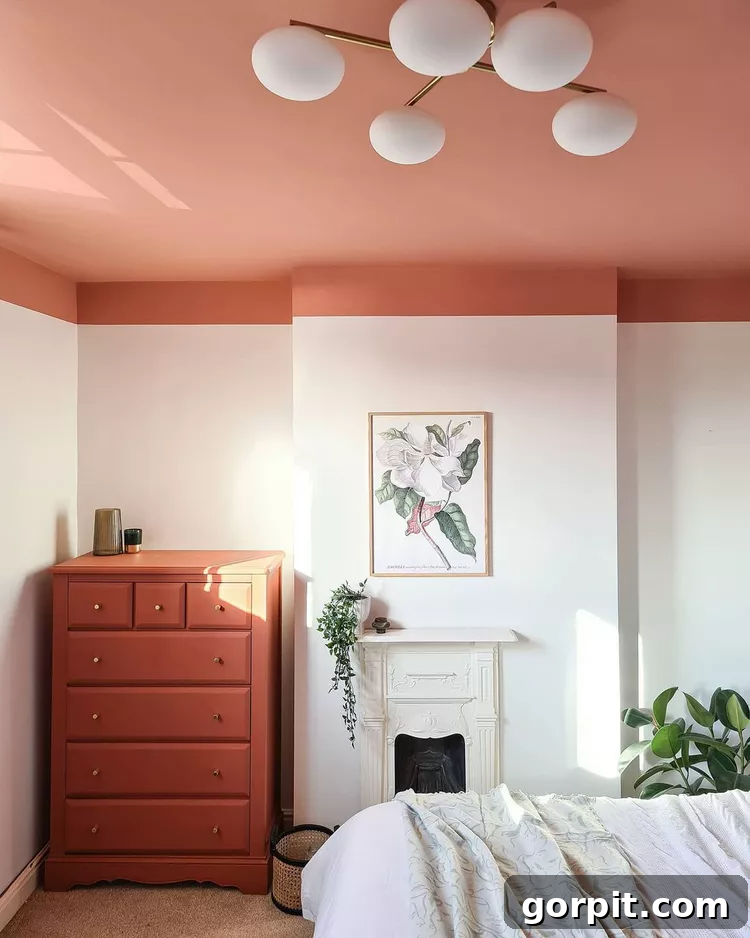Interior shot of a room with a light blue painted ceiling that extends onto the top portion of the walls, creating a serene and integrated look.