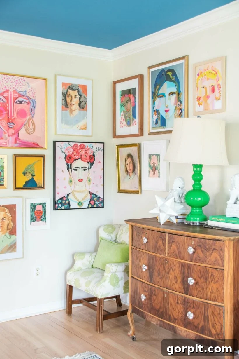 A brightly colored room featuring a striking, deep blue painted ceiling that adds a vibrant contrast and personality to the space.