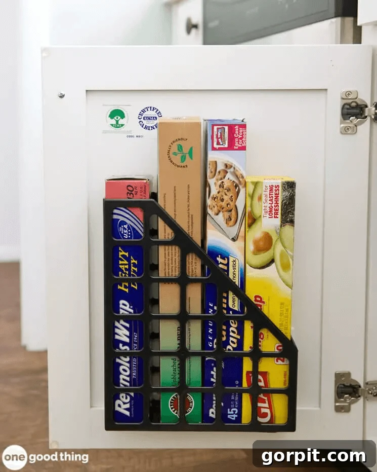Smart DIY Storage Hacks for Compact Living 17 magazine holder on inside of cabinet door for food wraps and bags