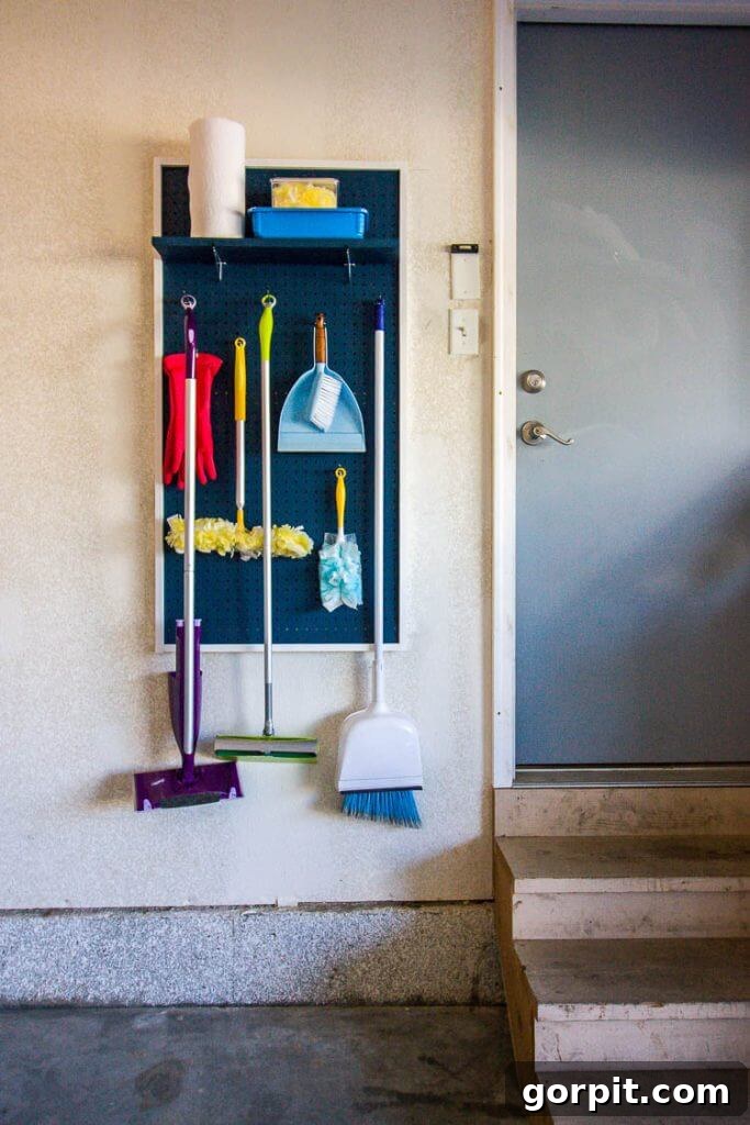 Smart DIY Storage Hacks for Compact Living 4 DIY peg board for cleaning tools and supplies