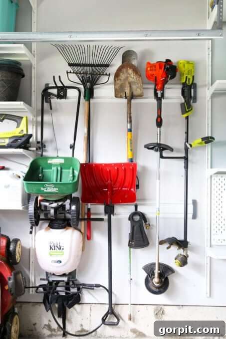 Smart DIY Storage Hacks for Compact Living 5 track system for yard tools and equipment