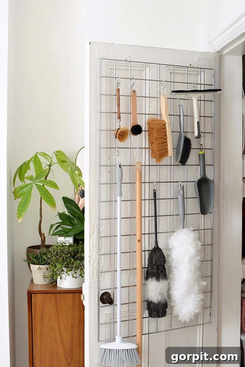 Smart DIY Storage Hacks for Compact Living 9 grid hanging system for inside a door for various items