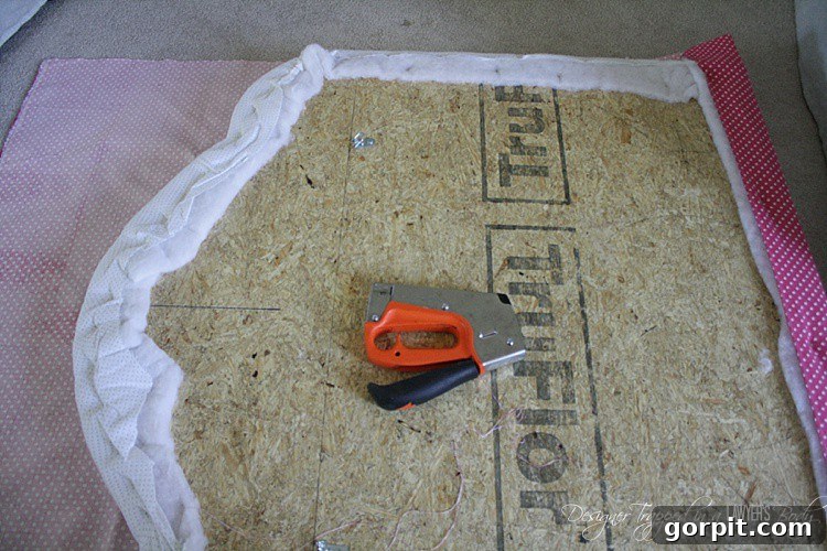 Close-up of the re-upholstered headboard
