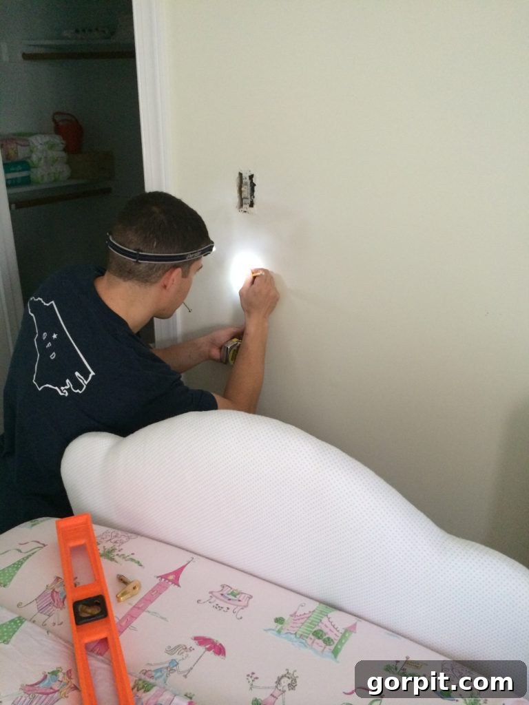 Installing D-rings for hanging the upholstered headboard