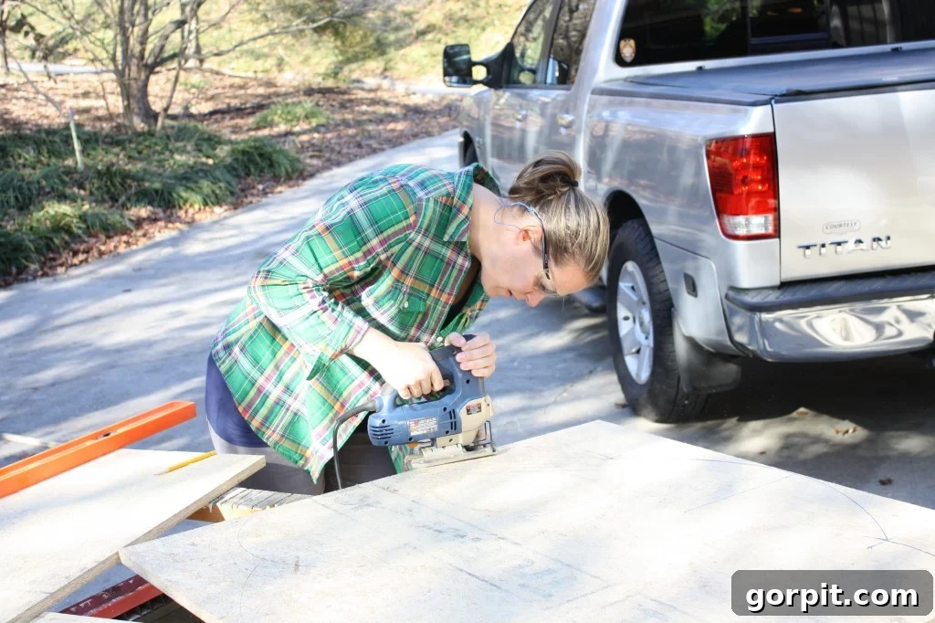 Cutting the headboard shape with a jigsaw