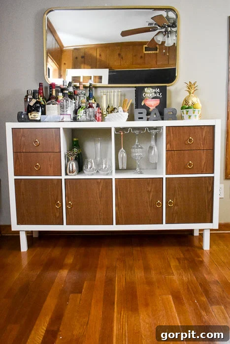 IKEA Kallax hack transformed into a stylish home bar cabinet with retro vibes and mixing counter space