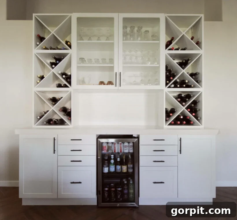 Custom built-in bar created from IKEA cabinetry with Semihandmade door fronts and integrated wine storage