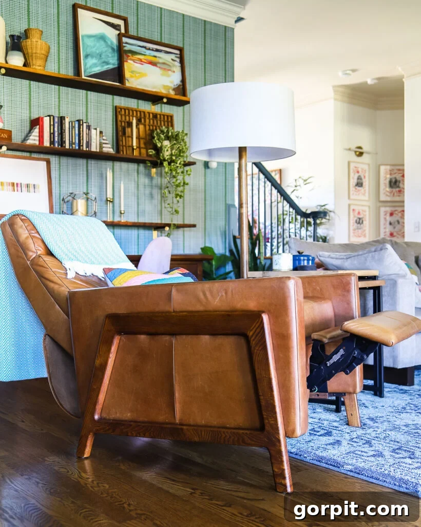 West Elm Spencer Recliner: Our Honest 5-Year Ownership Report 4 West Elm Spencer recliner review- photo of leather recliner in family room of Tasha Agruso of Kaleidoscope Living