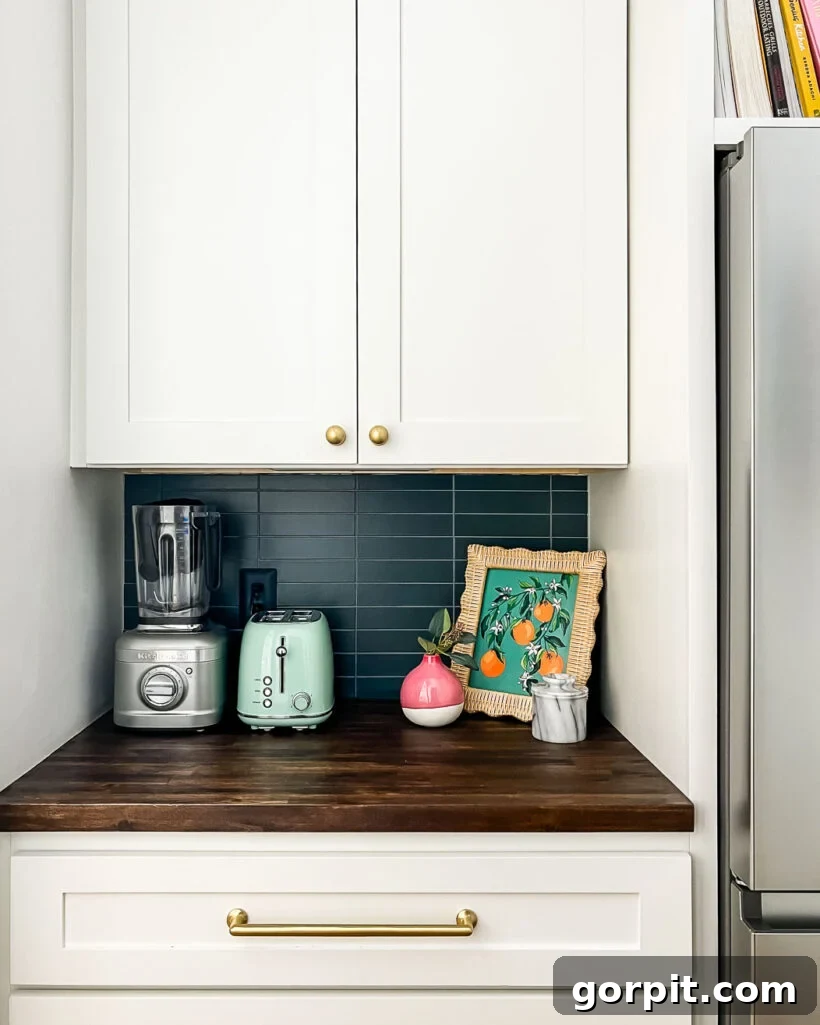 Close-up of the navy blue tile backsplash in the new butler's pantry.