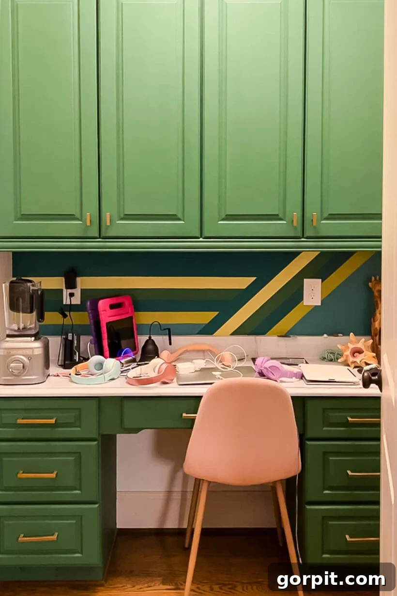 Cluttered built-in office desk area, highlighting the problem of unused space.