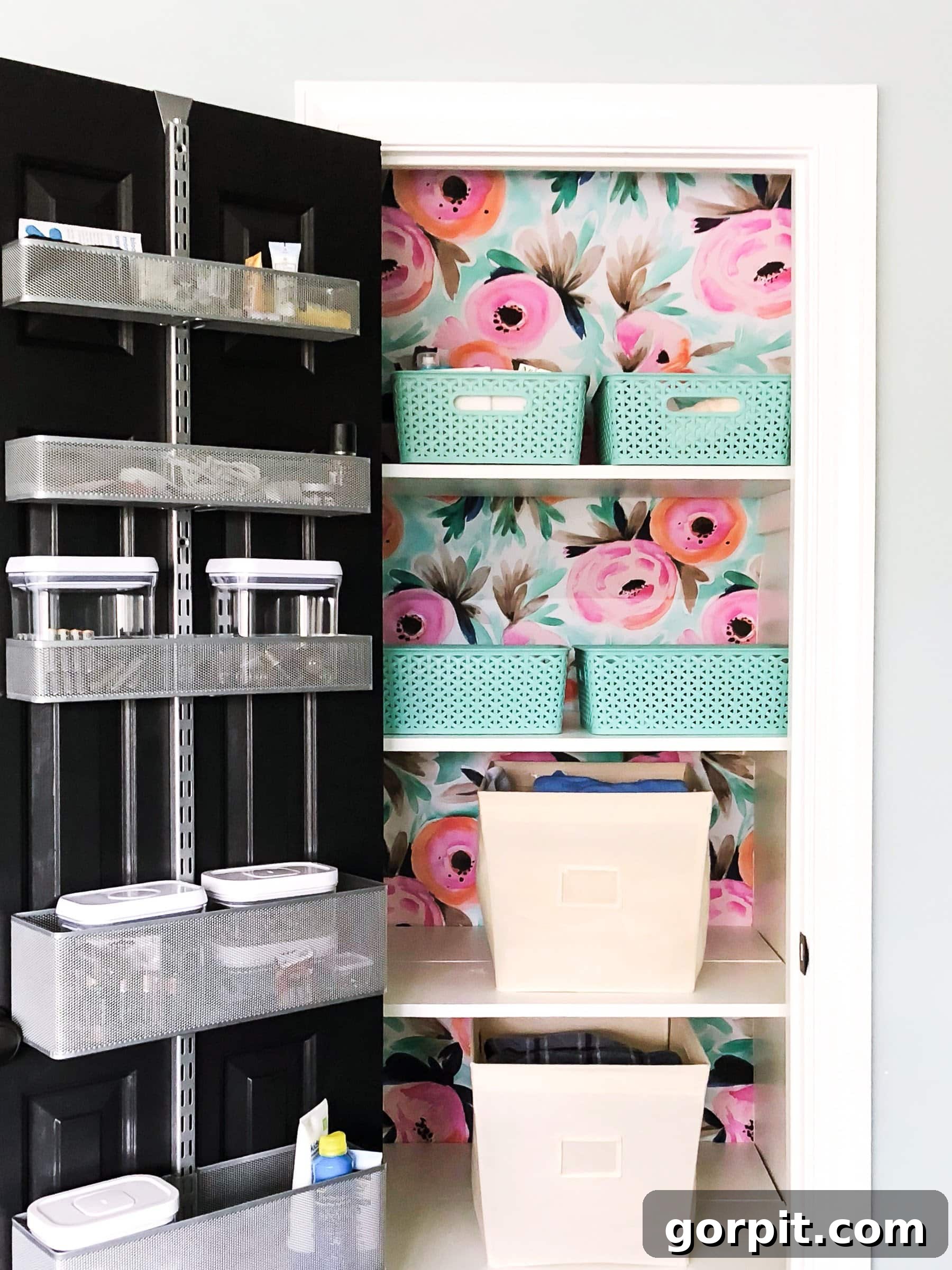 Transform Your Closets: 7 DIY Makeovers Using Our Favorite Systems 5 A pretty and organized linen closet with the Elfa closet system includes over the door storage and large flower wallpaper behind baskets on the shelves.