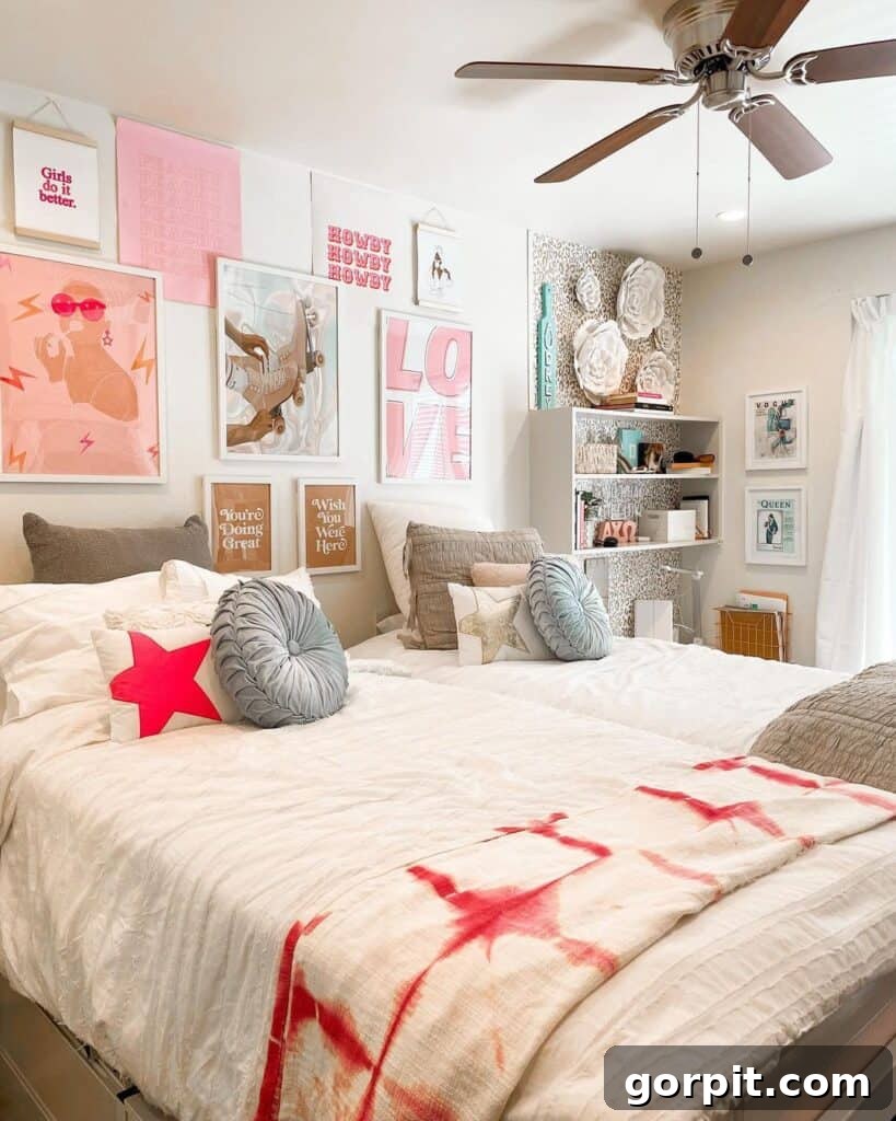 Dorm room ideas can reflect the student's personality, like this seaside inspired room with twin beds pushed together and a pink-toned gallery wall.